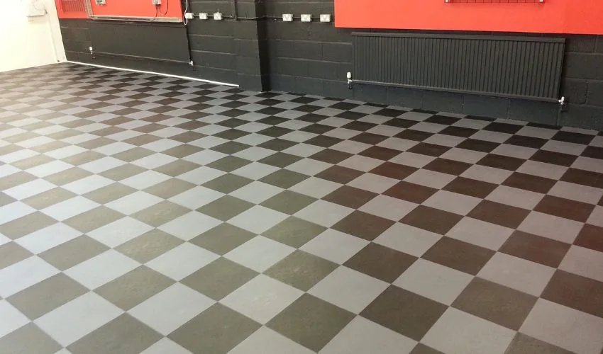 Water-resistant garage floor tiles installed on top