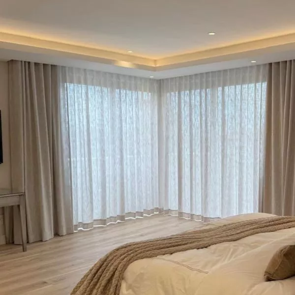 Motorized curtain track installation