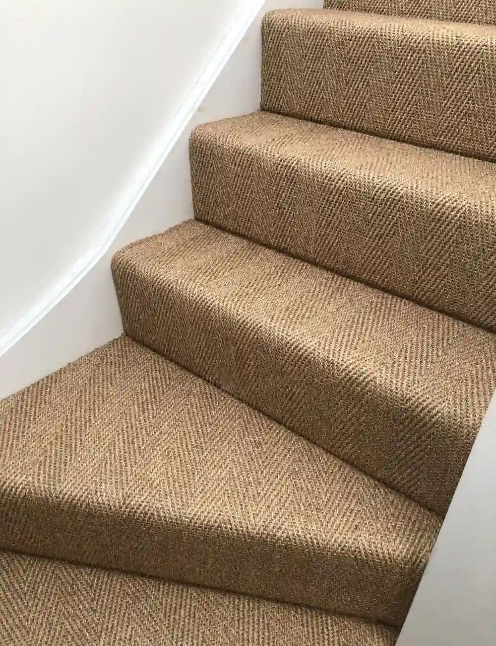 Sisal stair carpet runner installation in Dubai