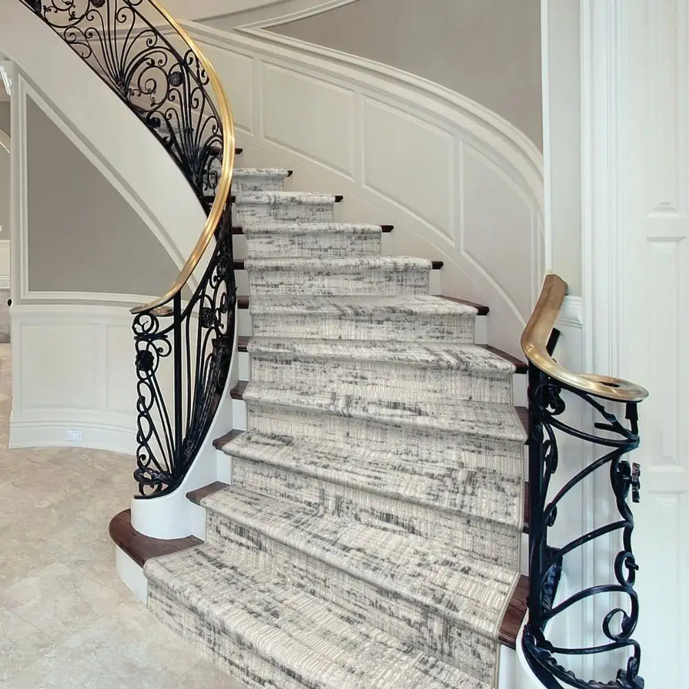 Stair carpet installation with rods in Dubai