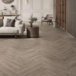 Plumley Taupe Oak Herringbone 8mm Laminate Flooring